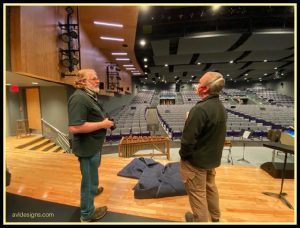 Stan on stage evaluating rigging