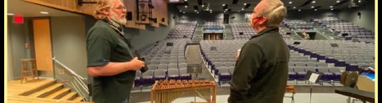 Stan on stage evaluating rigging