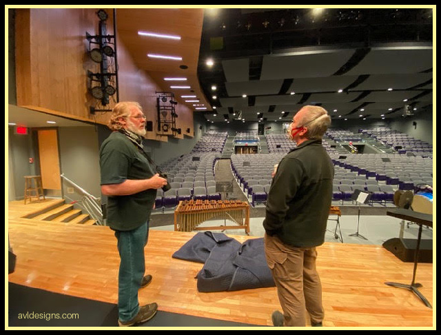 Stan on stage evaluating rigging